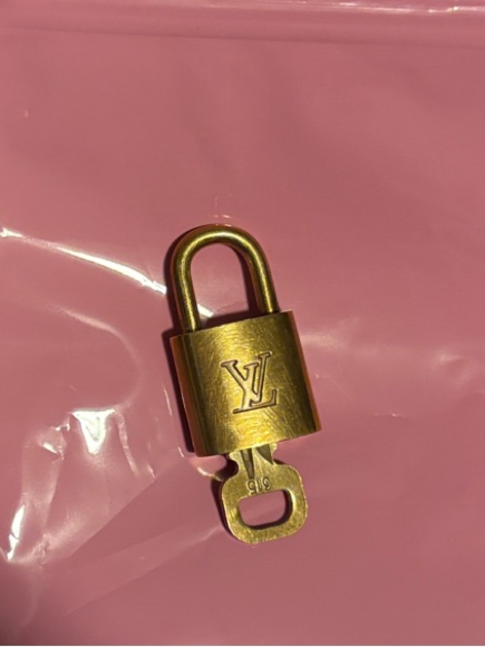 #315 Louis Vuitton padlock & key